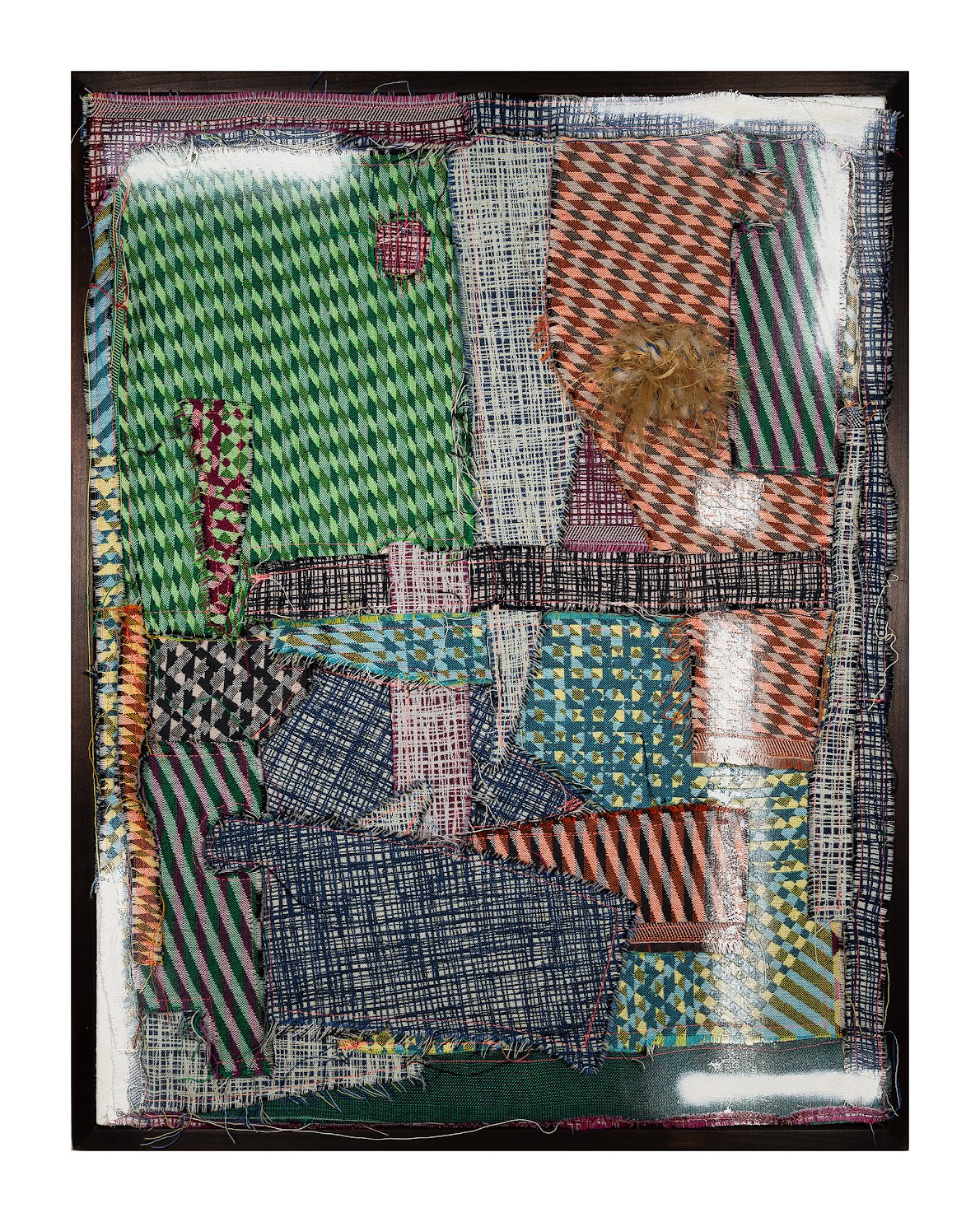 Aoi — abstract textile painting of stitched, upcycled jacquard remnants in green, orange, blue and cream, in a dark frame