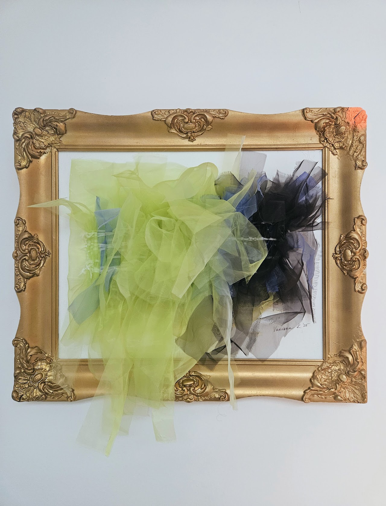 It's not waste unless you waste it — a gilded vintage frame holding a hand-drawn house painting, layered with green and dark tulle weaving and a neon-sprayed corner